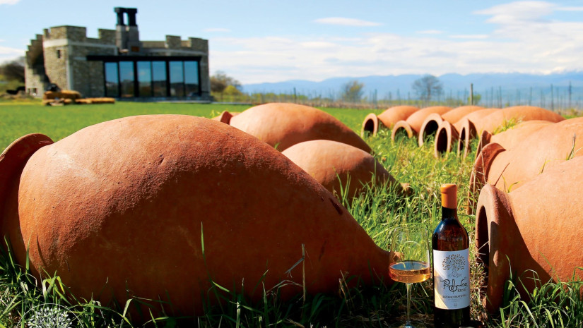 Qvevri clay vessels in the field beside Rtoni winery